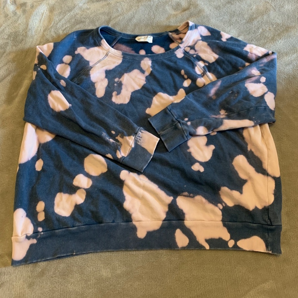 bleach-dyed blue sweatshirt